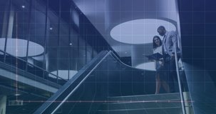 The video features a diverse group of businessmen and businesswomen talking and walking down the stairs of a modern office. The video is meant to symbolize global finance, economy and technology. 
