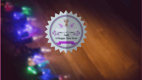 A single rice light is illuminated on a wooden plank during christmas time. A retro christmas label is on a green screen.  - Powered by Shutterstock - Get 15% off with code: PIKWIZARD15