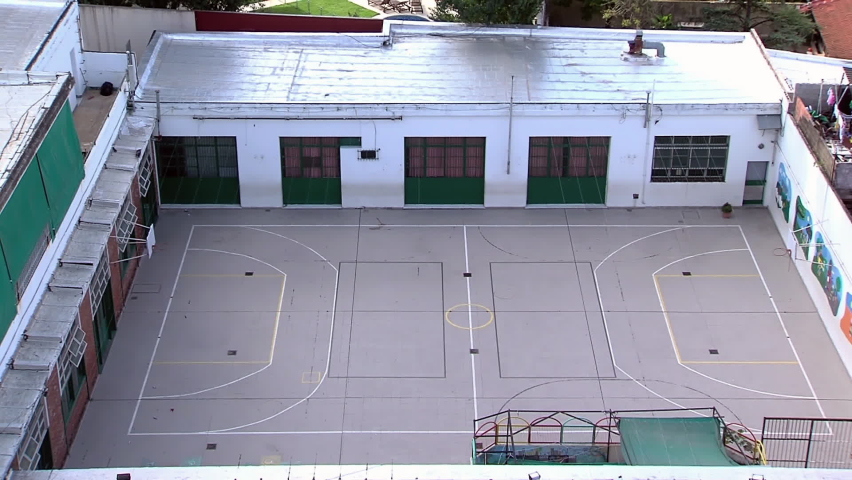 Outdoor Basketball Concrete Court at School Backyard in a Public School in Buenos Aires, Argentina. High Angle View. 