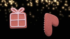 Animation of christmas gingerbread cookies over glowing snowflakes falling on black background. Christmas, festivity, tradition and celebration concept digitally generated video.