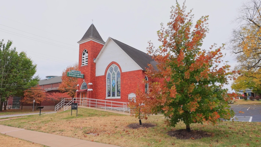 Overcast fall color landscape of the Washington Ave, Baptist Church of Drury University at Missouri