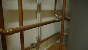 house heating installation with copper heating pipes - Powered by Shutterstock - Get 15% off with code: PIKWIZARD15