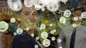 Animation of glowing dna helix, connected icons over smiling caucasian businesswoman in warehouse. Digital composite, multiple exposure, distribution, medical, genetic and technology concept. - Powered by Shutterstock - Get 15% off with code: PIKWIZARD15