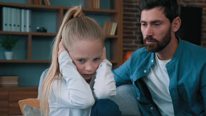 Sad offended little child daughter feel stress cover ears ignoring scream caucasian angry annoyed man dad shouting on girl for bad behavior and disobedience scolding kid problem of parenting in family Royalty-Free Stock Footage #1096722085