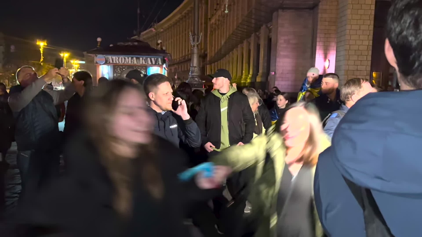 Kyiv, Ukraine - November, 11, 2022: Ukrainians, not restraining their happy emotions, celebrate the liberation of Kherson on the Independence Square.