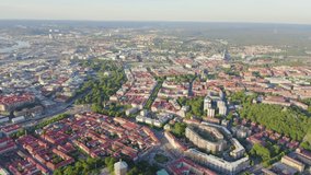 Inscription on video. Gothenburg, Sweden. Panorama of the city central part of the city. Sunset. Text from small balls, Aerial View