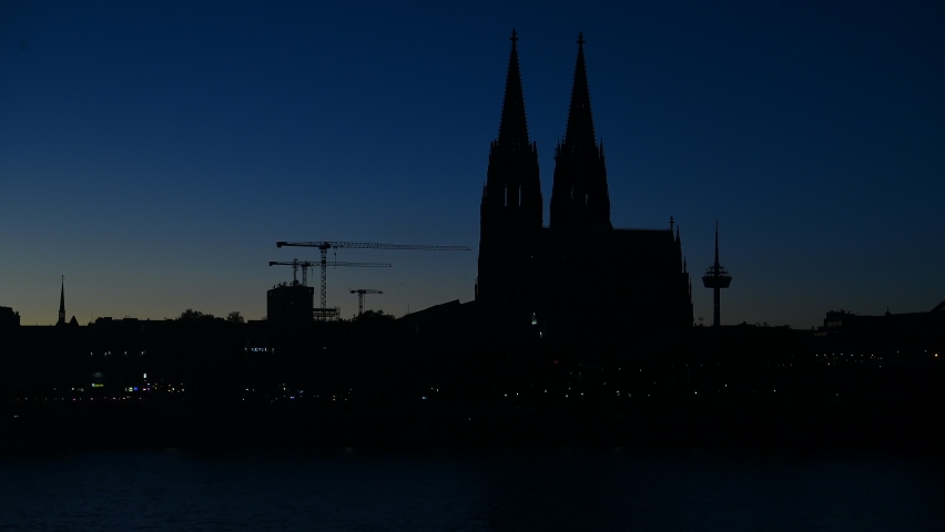 Silhouette of Cologne Cathedral. Cityscape of Cologne during sunset. Low key movie