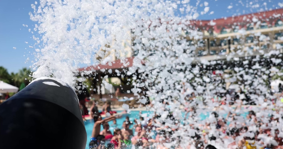 People at foam party in pool at resort hotel | Shutterstock HD Video #1096762865