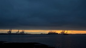4k time lapse of sunrise over the port of Felixstowe in Suffolk, UK
