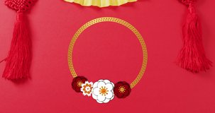 Animation of chinese pattern and decoration on red background. Chinese new year, festivity, celebration and tradition concept digitally generated video.