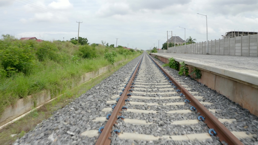 Close view of railway path through community in Ghana