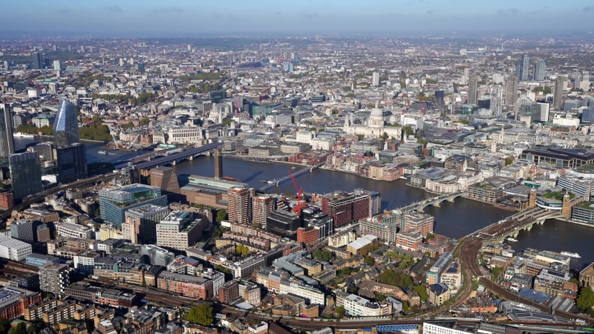 Aerial view from the Tate Modern Gallery, South Bank, St Paul's and the Shard to London Bridge, London UK. Royalty-Free Stock Footage #1096788683