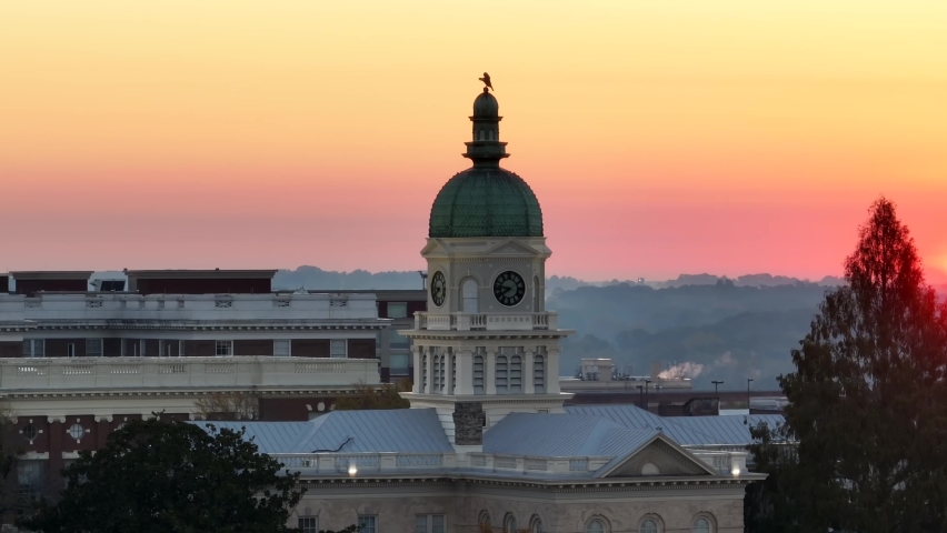 City Hall in Athens Georgia at sunrise. Aerial parallax shot in Athens GA USA. Large city near University of Georgia. Royalty-Free Stock Footage #1096788833