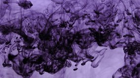 Abstract purple texture. Ink and paint in water on a white and black background. - Powered by Shutterstock - Get 15% off with code: PIKWIZARD15