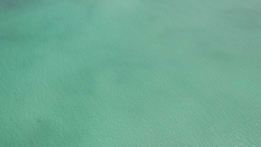 Off The Shores Of Great Keppel Island Is The Middle Island In The Capricorn Coast Of Central Queensland, Australia. Aerial Tilt-up