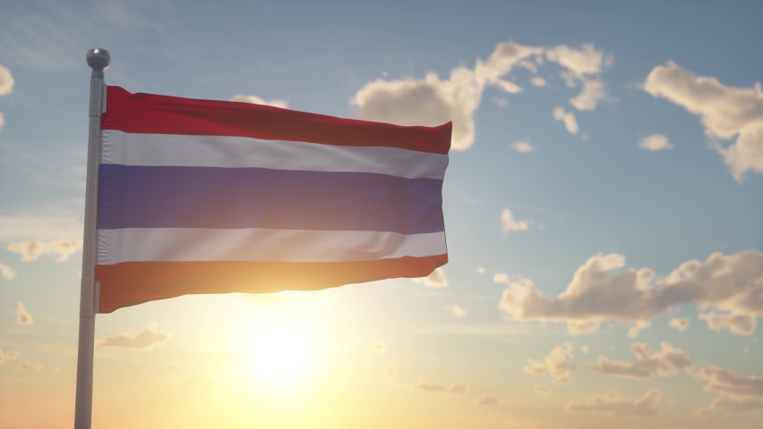 Thailand flag on pole waving in the wind sky background. The national flag of Thailand