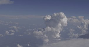 White clouds in the sky, shots from the plane, 4K