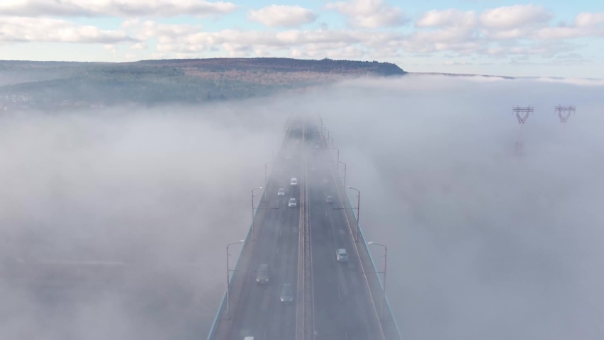 Aerial top view of the Asparuhov bridge in the fog in the morning, Varna, Bulgaria