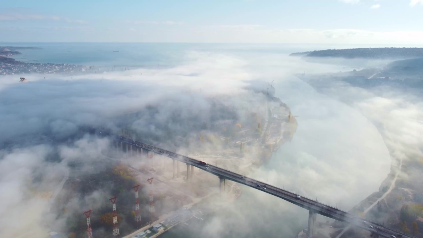 Aerial top view of the Asparuhov bridge in the fog in the morning, Varna, Bulgaria