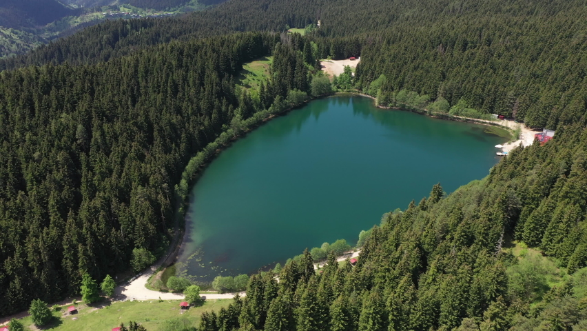 Heart shaped lake located in the forest - Savsat Black Lake