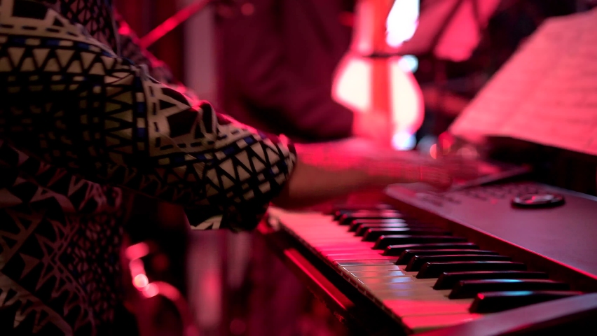 man playing piano in a salsa orchestra at a party Royalty-Free Stock Footage #1096826059