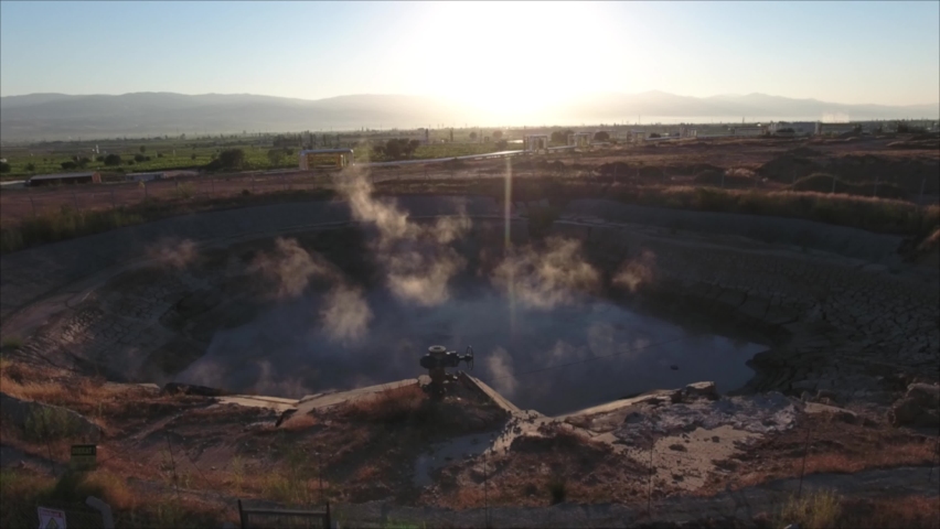Geothermal hot water pool in the middle of the plain