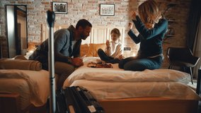 Happy family with their child have breakfast in bed while on vacation in the apartment - Powered by Shutterstock - Get 15% off with code: PIKWIZARD15