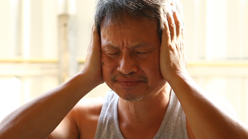 Thai man is closing ears  , in studio  Chiangmai  Thailand. | Shutterstock HD Video #1096880629
