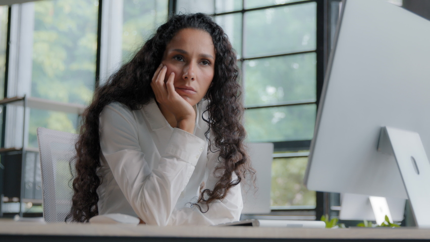 Focused serious tired businesswoman working in office on computer upset woman feeling frustrated due to problem and software error loss of important data unsaved information reads bad news by email Royalty-Free Stock Footage #1096887675