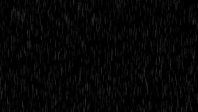 Heavy rain on a black background. Raindrops fall vertically to the bottom in calm weather on a black background.