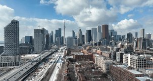 Aerial cinematic Distillery District QEW downtown Toronto Go Train