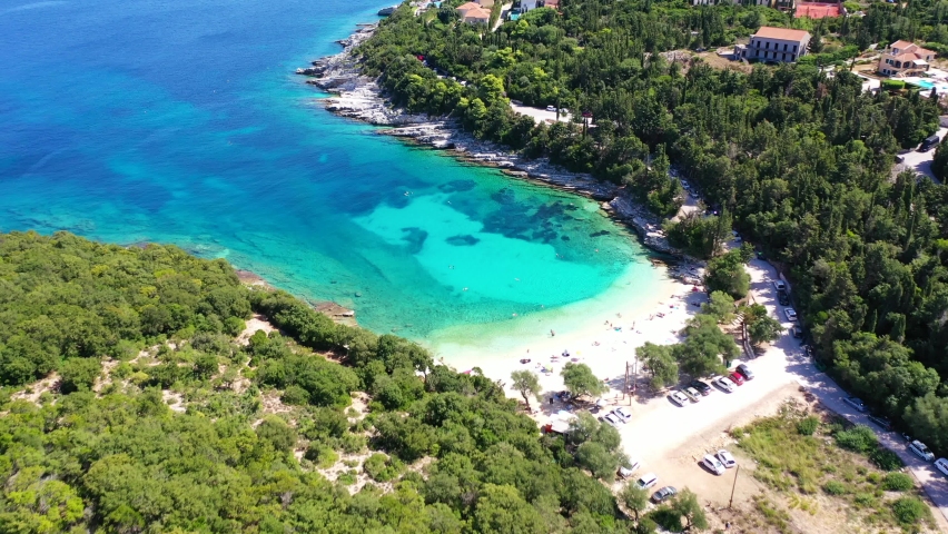 Aerial drone video of exotic paradise beach of Emblisi with turquoise and emerald clear sea near iconic Fiskardo bay, Cefalonia island, Ionian, Greece