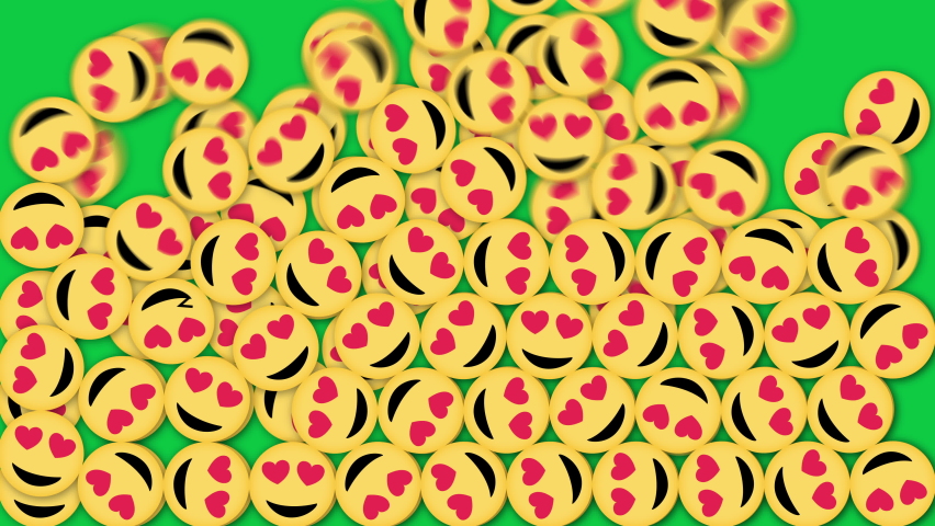Smiling Face with Heart-Eyes Emoji Emoticon Transition Isolated on Green Screen Background. Love Emotions Falling in and Filling up the Screen Then Dropping down to Reveal the Background.