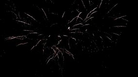 Real Firework close up on Deep Black Background Sky on Fireworks festival before new year party 2023 , Independence day and Christmas eve concept. High quality 4k video