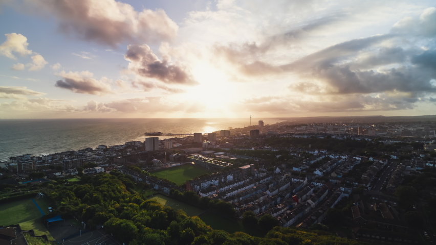 Establishing Aerial View Shot of Brighton UK, East Sussex, England United Kingdom day, incredible heavenly light, push in Royalty-Free Stock Footage #1096913843