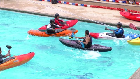 Banos Ecuador - 23 May 2015: Kayak Polo In Swimming Pool For Santa Ana Summer Contest In Ecuador In Banos On May 23 2015