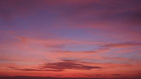 4K UHD : sky timelapse, Burning sky and shining, Red purple orange blue pink. Romantic colorful sky and sunrise clouds. winter sky. weather and the movement of nature concept
 - Powered by Shutterstock - Get 15% off with code: PIKWIZARD15