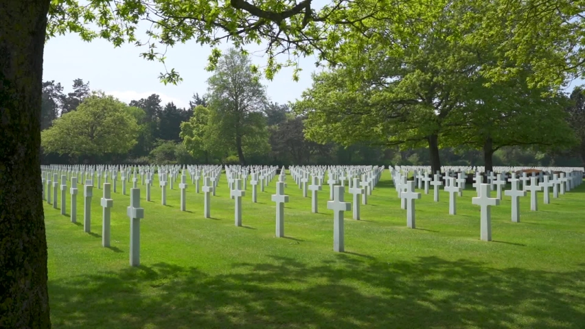 Panning view of Gravestones at American Soldier Cemetery in Normandy France