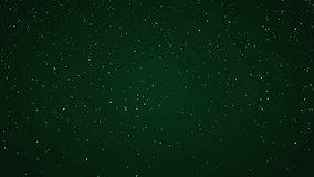 Animation of merry christmas and a happy new year text over snow falling on green background. Christmas, tradition and celebration concept digitally generated video.