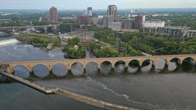 4K Aerial Orbit of Stone Arch Bridge on a Cloudy Minneapolis Morning - Powered by Shutterstock - Get 15% off with code: PIKWIZARD15