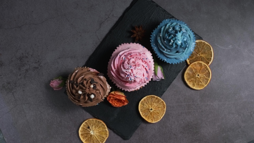 three different cakes on the table are taken at the same time