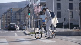 Child crossing street in city crosswalk with mother outdoors - Powered by Shutterstock - Get 15% off with code: PIKWIZARD15