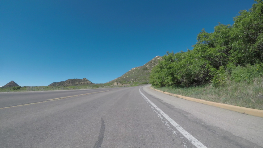Driving Under A Bright Blue Sky In Mesa Verde National Park