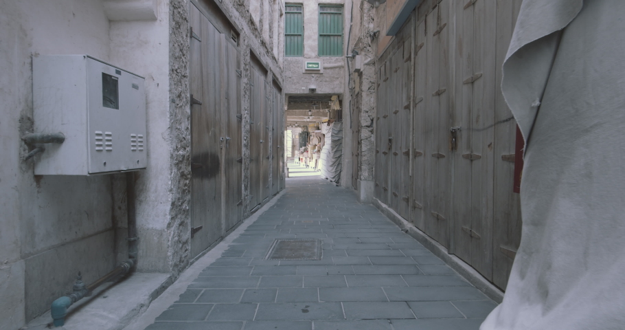Qatar, Doha - Old Town alley with wooden doors