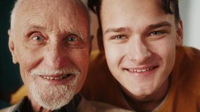 Family portrait of old and young man, grandfather and grandson. Face lifting, aging and skincare concept for men. Youth and old age. Process of aging and rejuvenation, pensioner retirement and student - Powered by Shutterstock - Get 15% off with code: PIKWIZARD15
