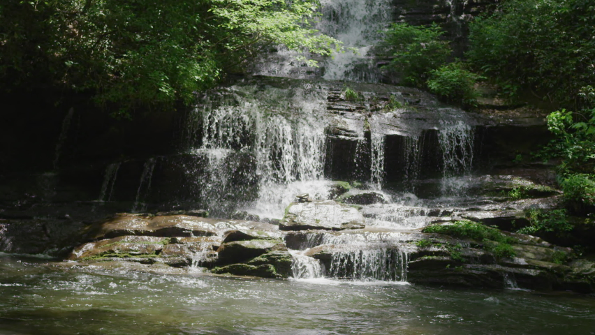 Slow motion close up static shot of Deep Creek waterfall in Great Smoky Mountain National Park, North Carolina