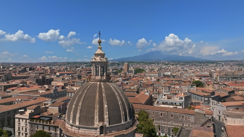Aerial view on via Etnea in Catania. Dome of Catania and the main street with the background of volcano Etna, Sicily, Italy. Catania the UNESCO World Heritage. | Shutterstock HD Video #1096988051