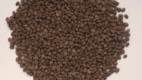 4k video of close up of coffee beans, coffee beans as texture.