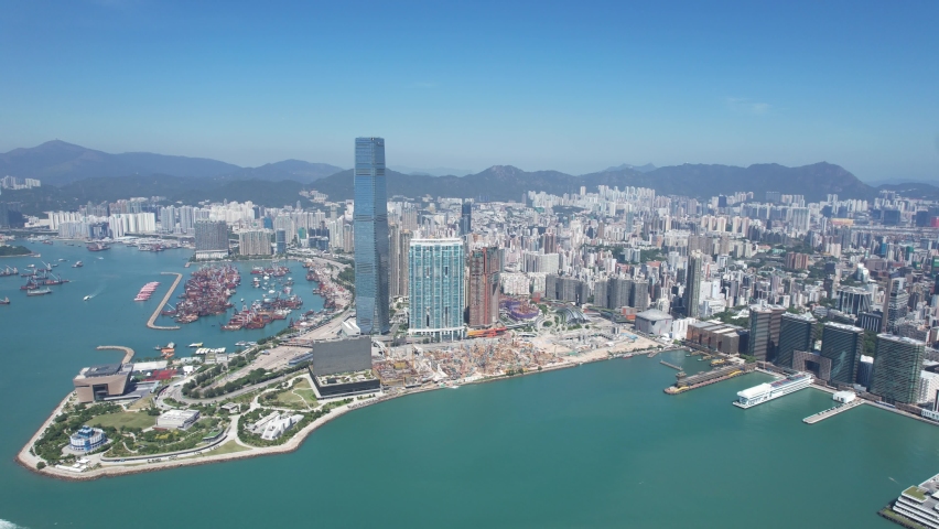 West Kowloon Cultural Area, A Waterfront Leisure Promenade Palace Museum Freespace near Tsim Sha Tsui, Central, Victoria Harbour, Hong Kong in the background, Aerial drone skyview | Shutterstock HD Video #1097026263