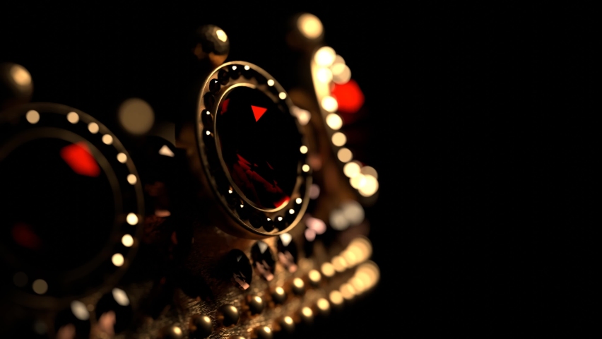 Golden crown with rubies on black background 3D 4K looped animation with copy space. Sparkling royal corona. Close-up. Royalty-Free Stock Footage #1097031007